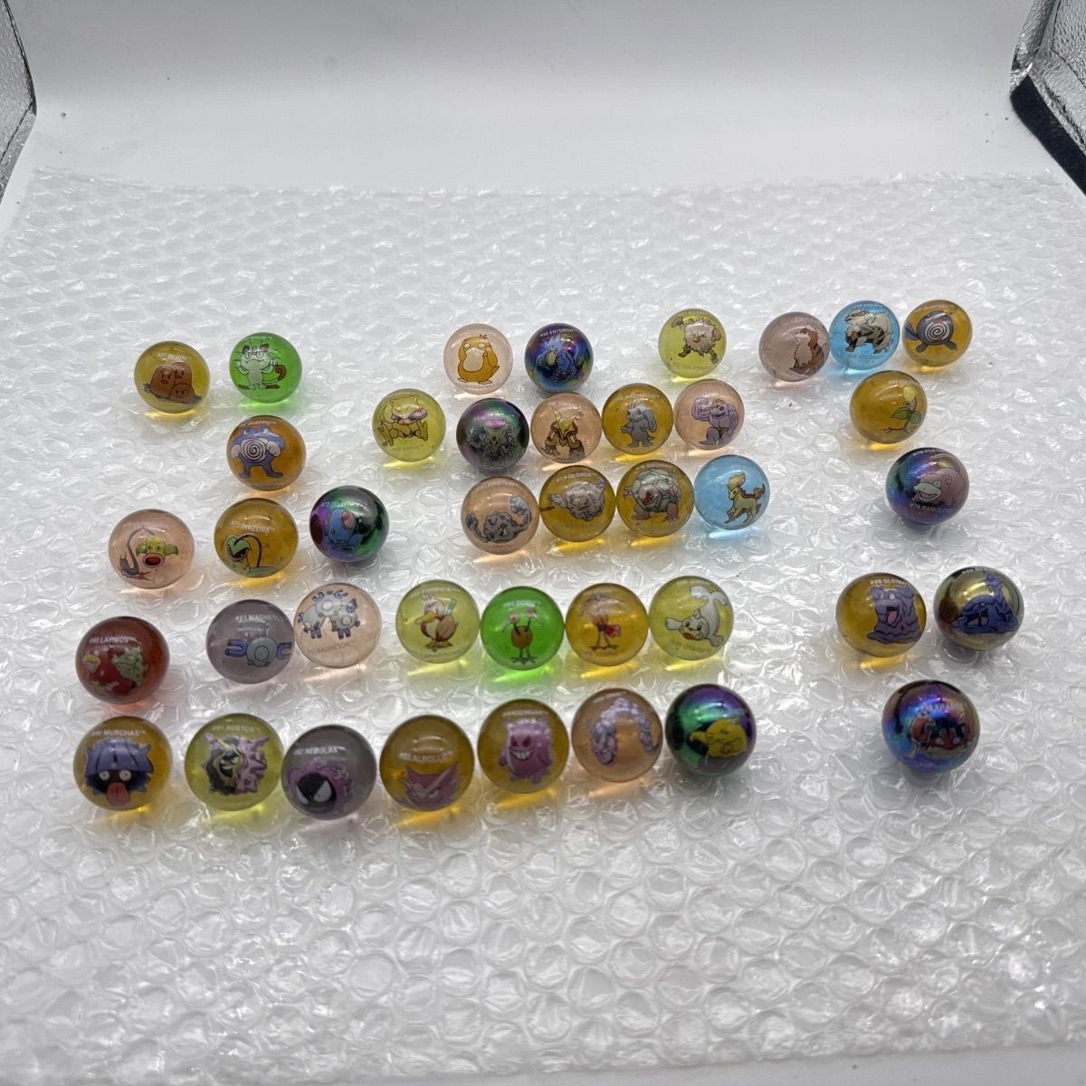 สินค้าโปเกมอนของแท้จำนวนมาก, ล - Vintage Collectible Marbles บทวิจารณ์และราคา